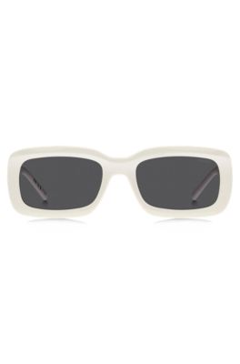 White sunglasses with stacked-logo temples, White