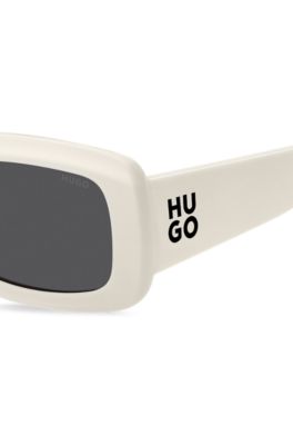 White sunglasses with stacked-logo temples, White