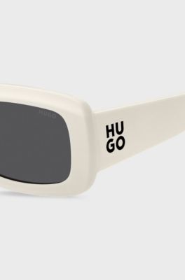White sunglasses with stacked-logo temples, White