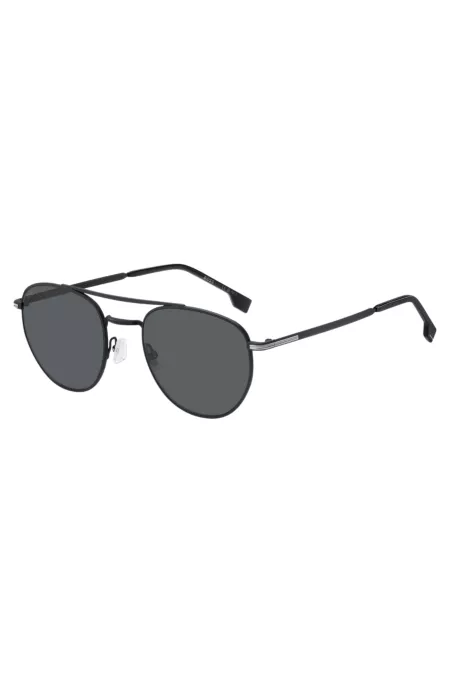 Round sunglasses in black metal with double bridge
