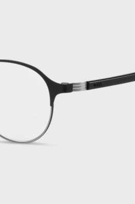 Round optical frames in black steel with striped hinge, Black