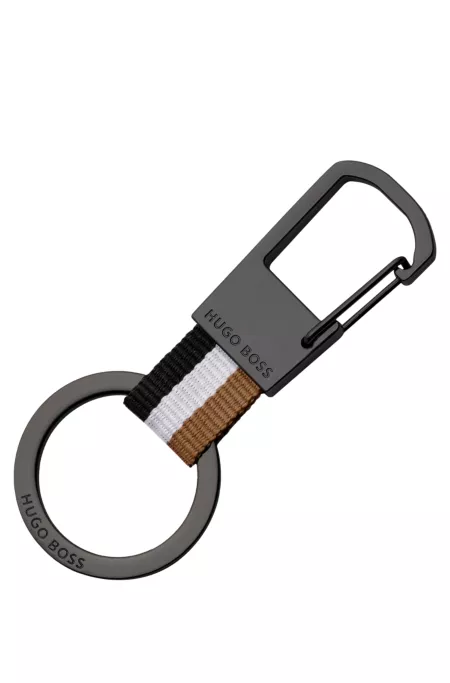 Signature-stripe key ring with dark-chrome accents