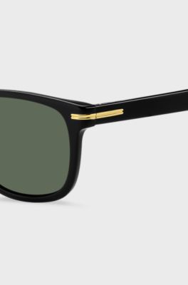 Lunettes de soleil en ac&eacute;tate noir avec garnitures en m&eacute;tal dor&eacute;, Noir