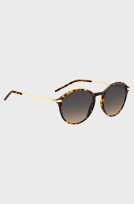Gafas de sol redondas en acetato con dise&ntilde;o Habana y patillas doradas, Marr&oacute;n
