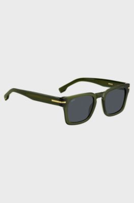 Sonnenbrille aus gr&uuml;nem Acetat mit goldfarbenen Metalldetails, Gr&uuml;n