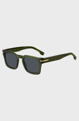 Gafas de sol de acetato verde con detalles met&aacute;licos en tono dorado, Verde