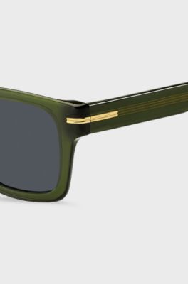Sonnenbrille aus gr&uuml;nem Acetat mit goldfarbenen Metalldetails, Gr&uuml;n