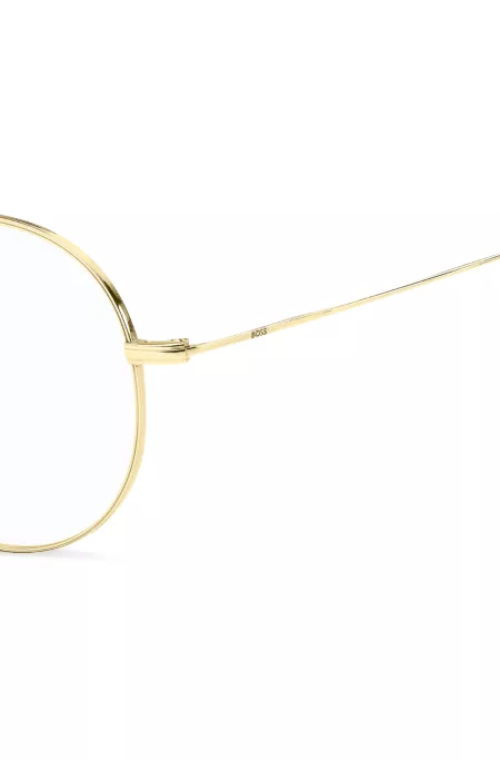 Monture optique ronde en métal doré avec logo gravé au laser