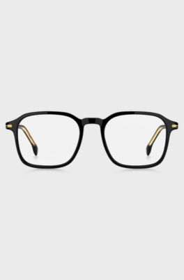 Black-acetate optical frames with gold-tone details, Black