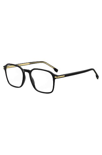 Brillenfassung aus schwarzem Acetat mit goldfarbenen Details, Schwarz