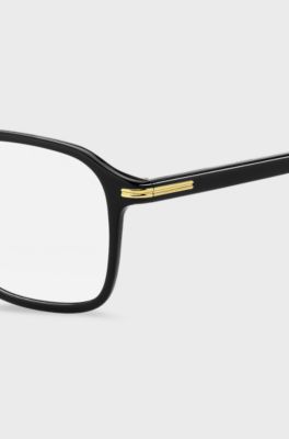 Black-acetate optical frames with gold-tone details, Black