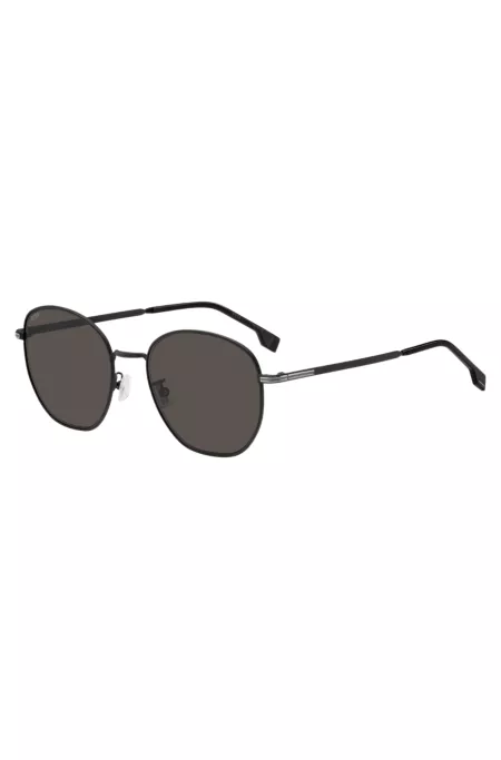 Round sunglasses in black metal with silver-tone hardware