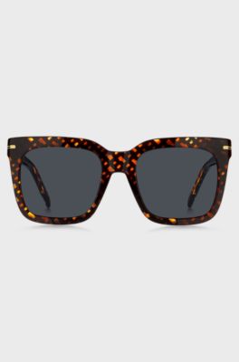 Monogram-patterned sunglasses with gold-tone hardware, Patterned