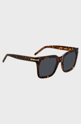 Monogram-patterned sunglasses with gold-tone hardware, Patterned