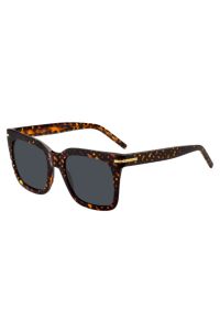 Sonnenbrille mit goldfarbenen Metalldetails und Monogramm-Muster, Gemustert