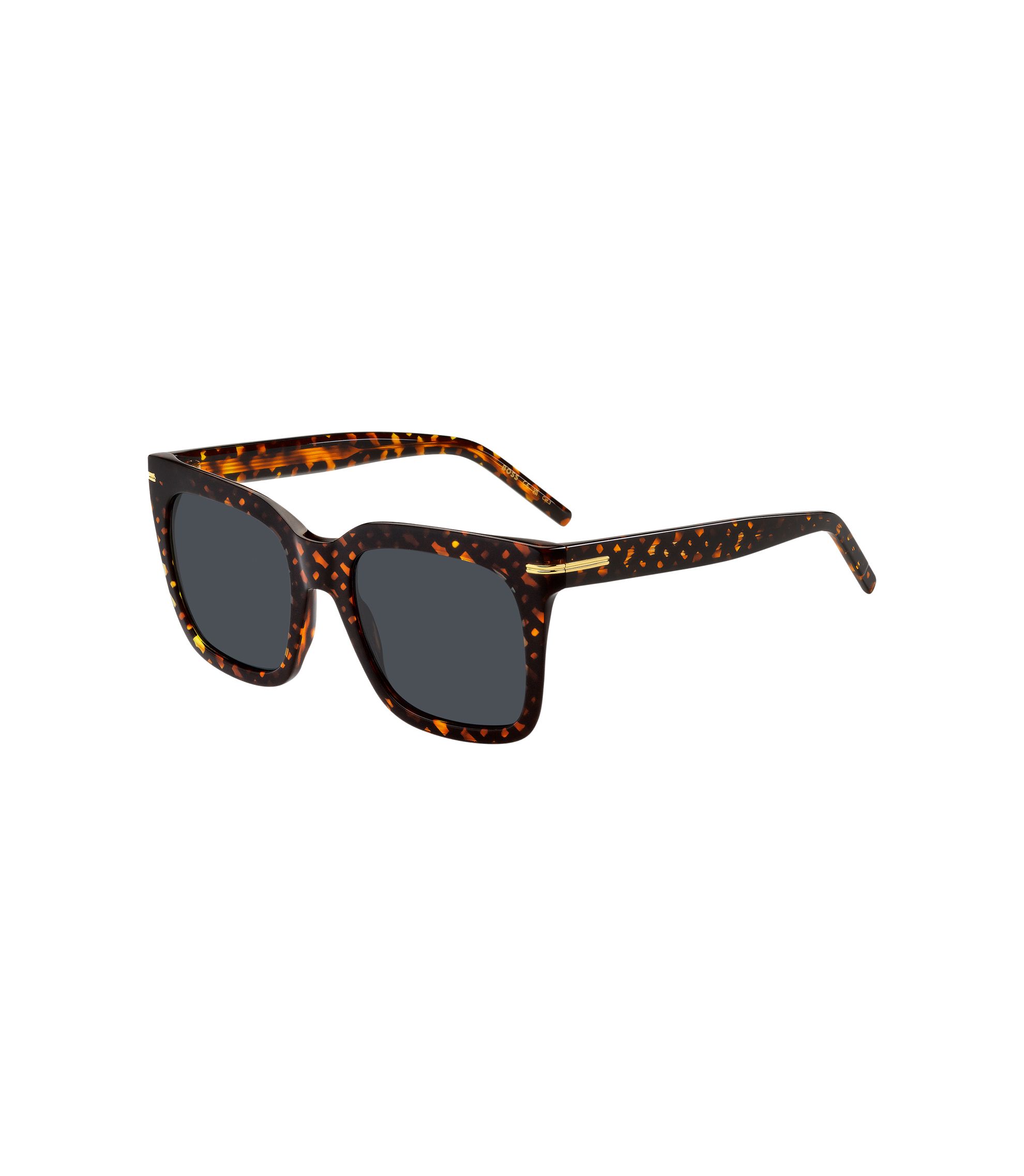 Sonnenbrille mit goldfarbenen Metalldetails und Monogramm-Muster
