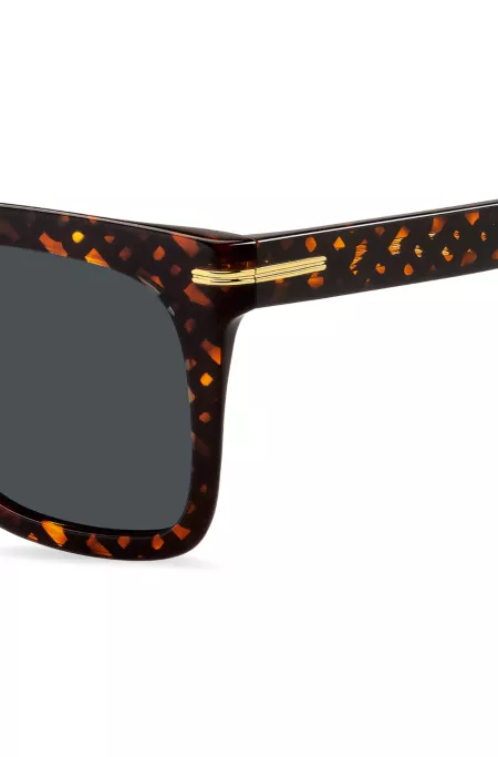 Monogram-patterned sunglasses with gold-tone hardware