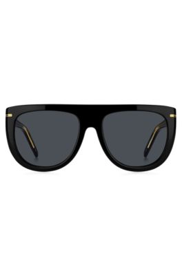 Sonnenbrille aus schwarzem Acetat mit goldfarbenen Metalldetails, Schwarz