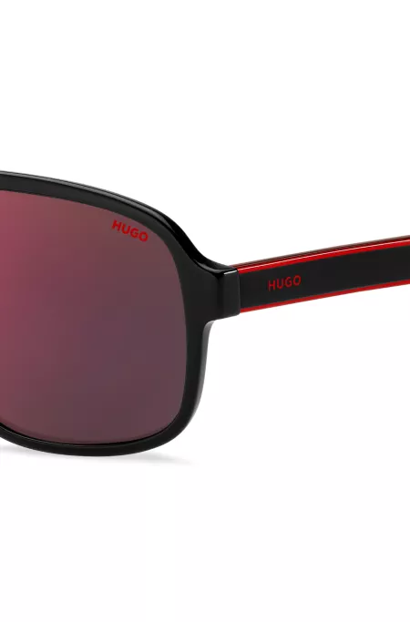 Black-acetate sunglasses with red shaded lenses