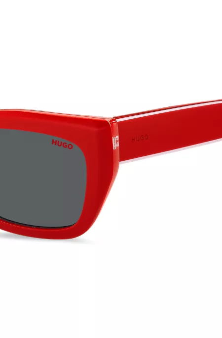 Red-acetate sunglasses with layered temples