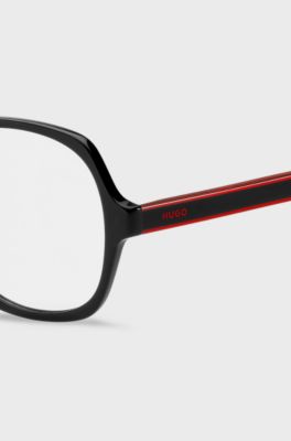 Black-acetate optical frames with signature-red layered temples, Black
