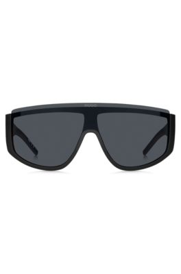Mask-style sunglasses in black with stacked logo, Black
