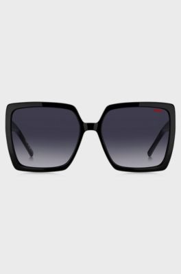 Sonnenbrille aus schwarzem Acetat mit Stack-Logo, Schwarz