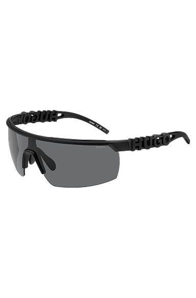 Schwarze Sonnenbrille im Masken-Stil mit 3D-Logo auf den Bügeln, Schwarz