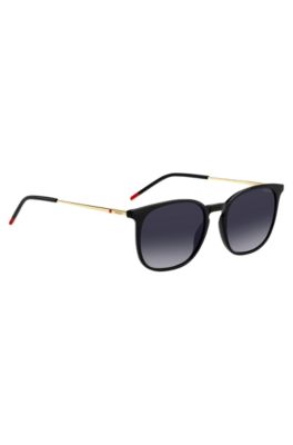 Black sunglasses with gold-tone temples, Black
