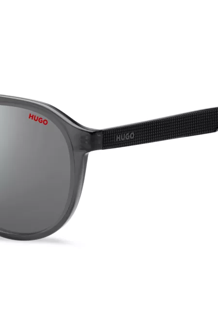 Double-bridge sunglasses in grey acetate with patterned temples