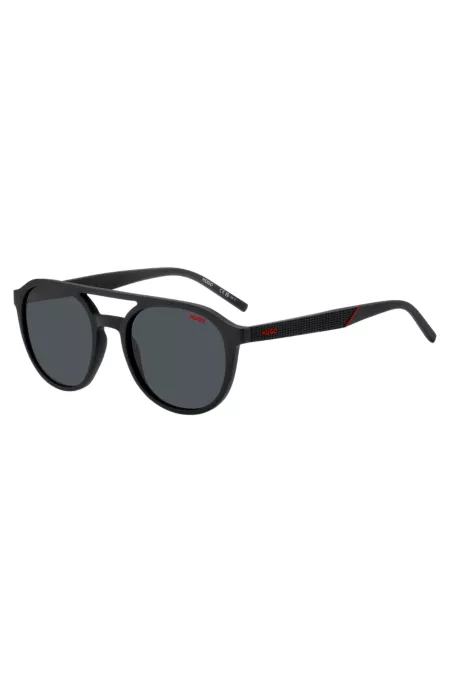 Matte-black sunglasses with patterned temples