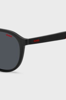 Matte-black sunglasses with patterned temples, Black
