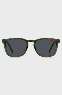 Green sunglasses with patterned temples, Green