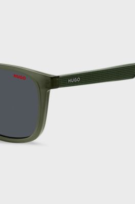 Green sunglasses with patterned temples, Green