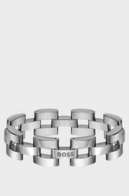 Link-style cuff in polished steel with branded detail, Silver tone