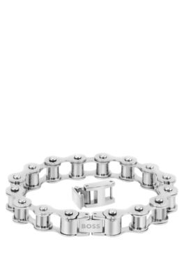 Bike-chain-inspired cuff with branded closure, Silver tone
