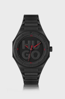Black watch with silicone strap and stacked-logo dial, Black