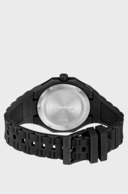 Black watch with silicone strap and stacked-logo dial, Black
