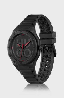 Black watch with silicone strap and stacked-logo dial, Black