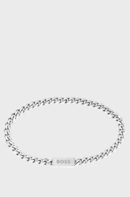 Curb-chain cuff in stainless steel with branded closure, Silver tone