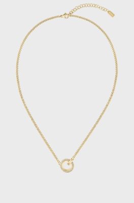 Gold-tone necklace with crystal-set pendant, Gold tone