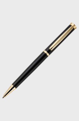 Matte-black ballpoint pen with gold-tone accents, Black