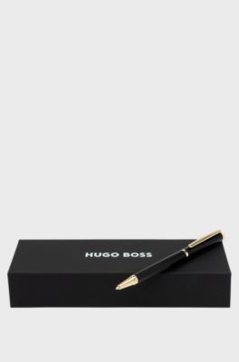 Matte-black ballpoint pen with gold-tone accents, Black
