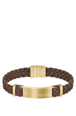 Bracelet tressé en cuir suédé marron avec plaquette logo