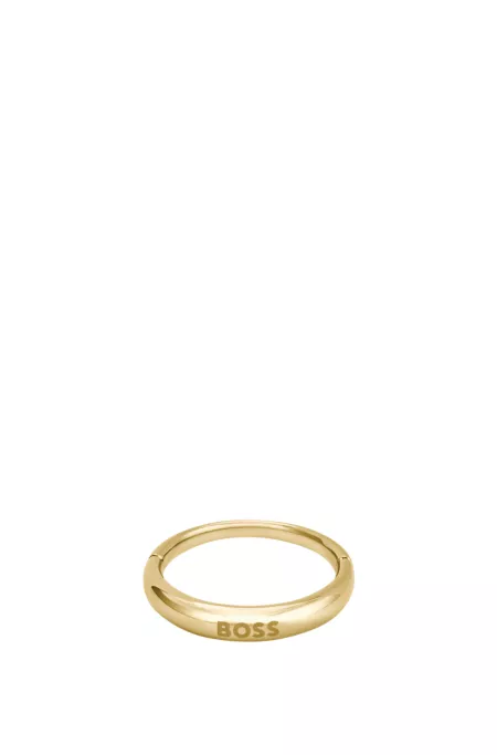 Gold-tone ring with logo detail