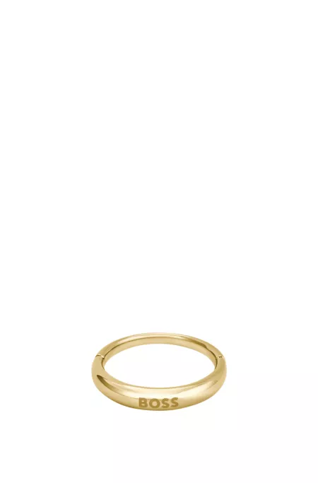 Gold-tone ring with logo detail