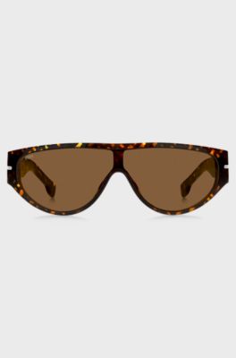 Sonnenbrille im Masken-Stil aus Acetat mit Monogramm-Muster, Gemustert
