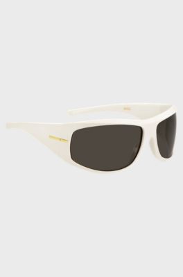 Witte zonnebril in maskerstijl met goudkleurige hardware, Wit