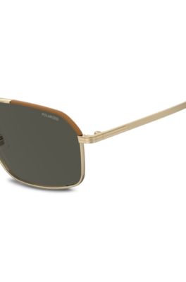 Italiensk fremstillede limited collection-solbriller med l&aelig;derdetaljer, Guld