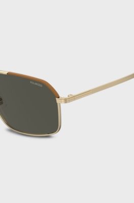 Limited-edition Italian-crafted sunglasses with leather trims, Gold